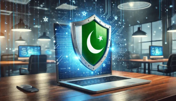 Digital security shield on laptop screen, Pakistan flag