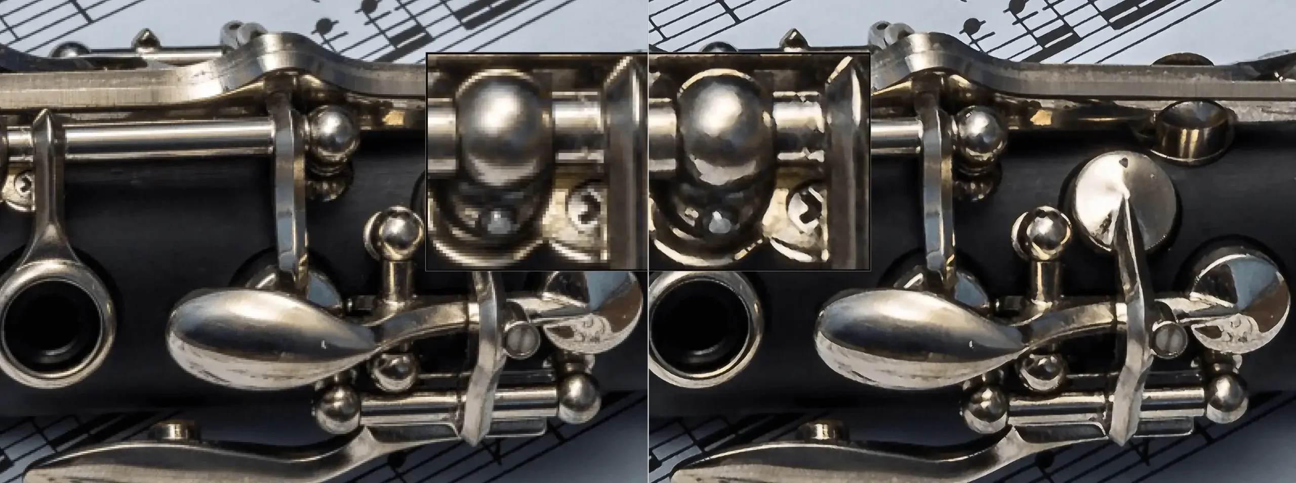 Close-up of clarinet keys with sheet music background