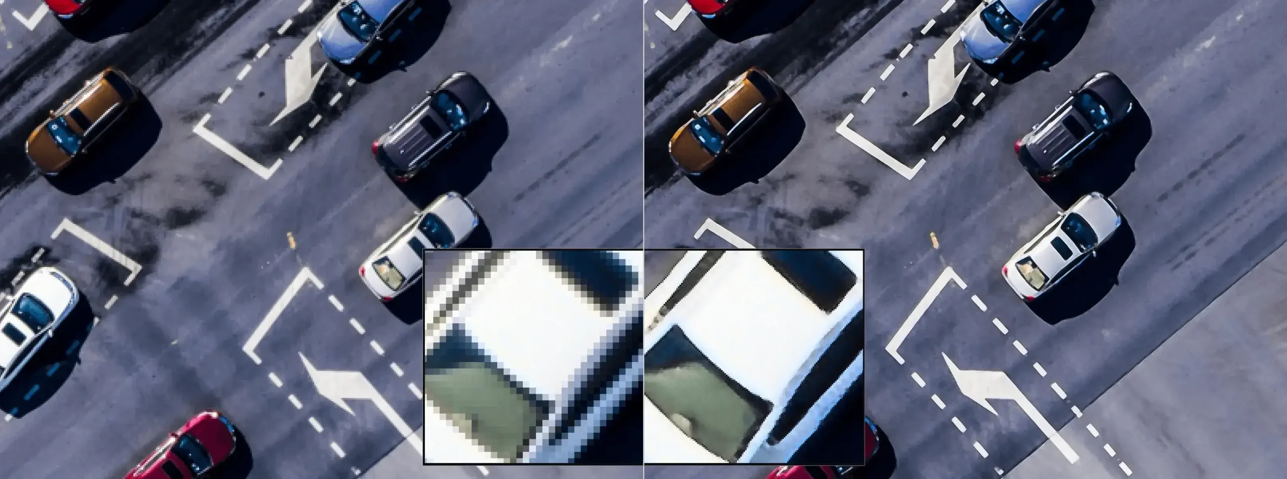 Aerial view of cars at intersection with lane markings